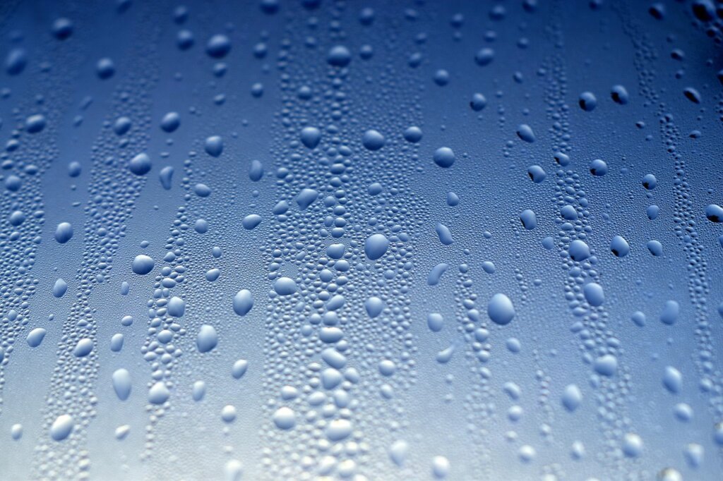 winter window condensation droplets close up