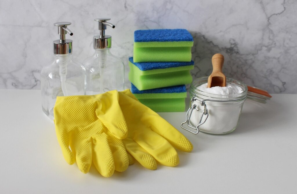 kitchen tiles being sprayed with sesquicarbonate soda cleaning solution