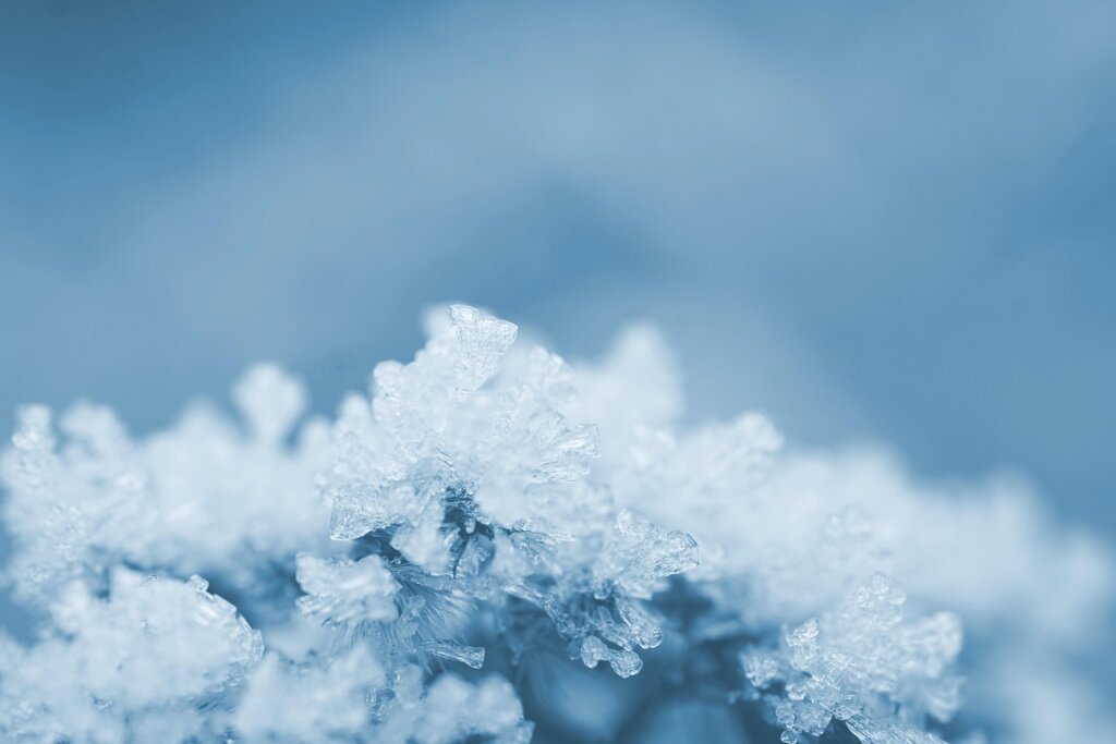 thick frost ice inside freezer compartment before cleaning