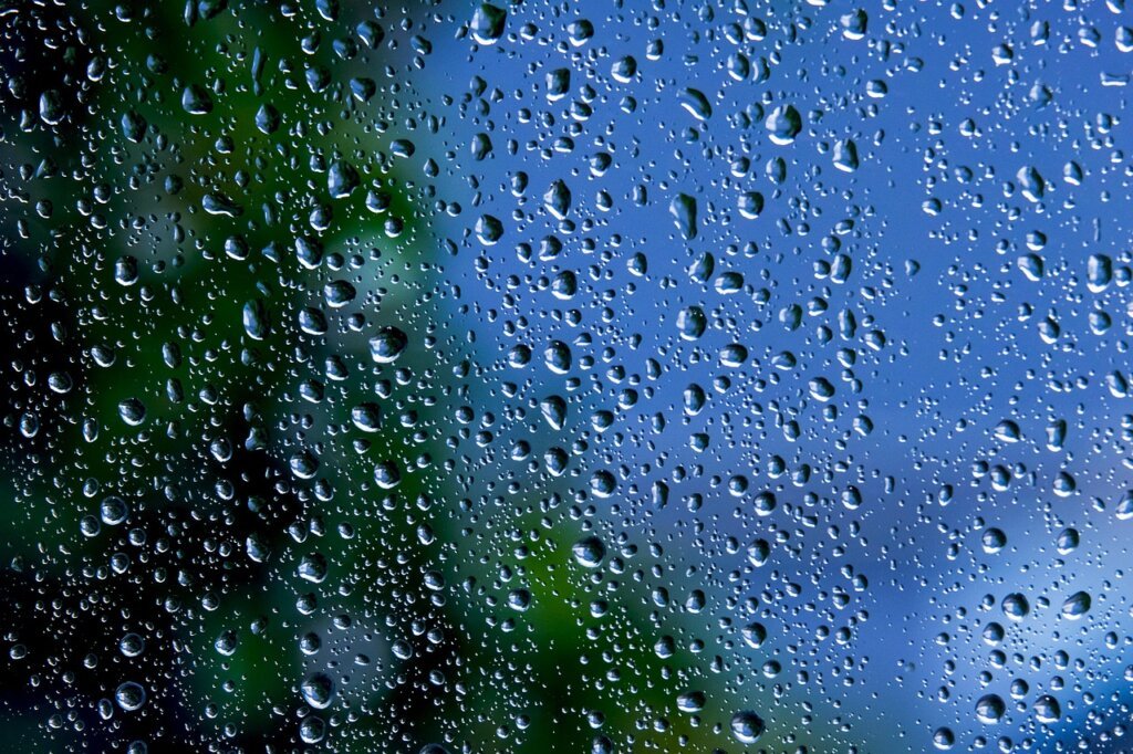 hard water stains on window glass close-up