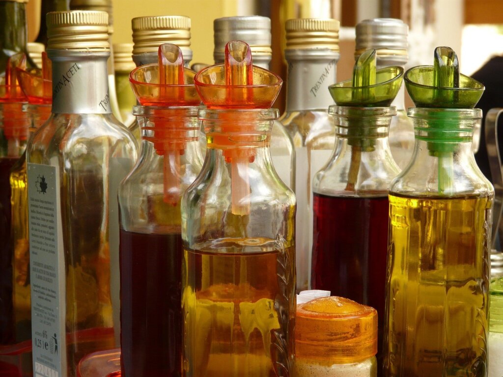 vinegar water spray solution in bottle near window