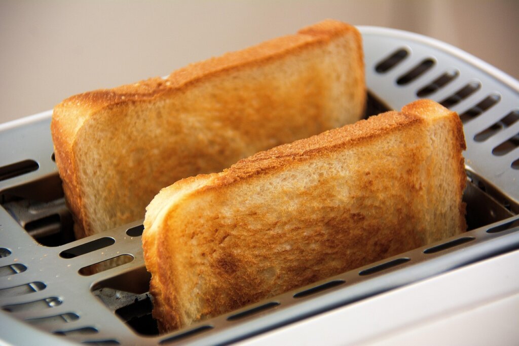 bread slices wrapped individually in plastic wrap before freezing