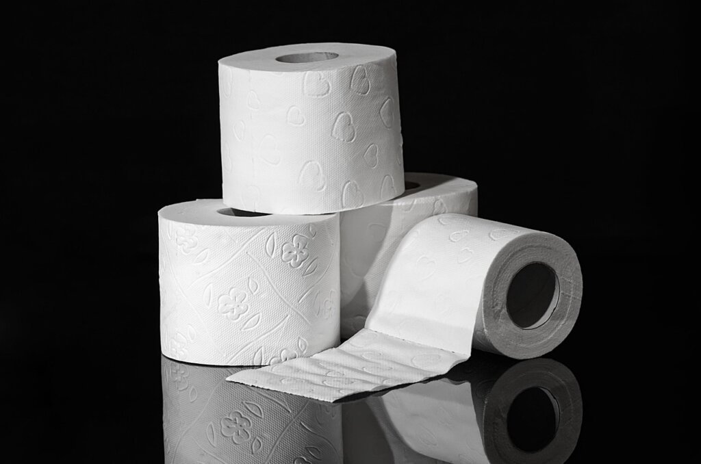 kitchen drawer divided into sections with toilet paper rolls as dividers