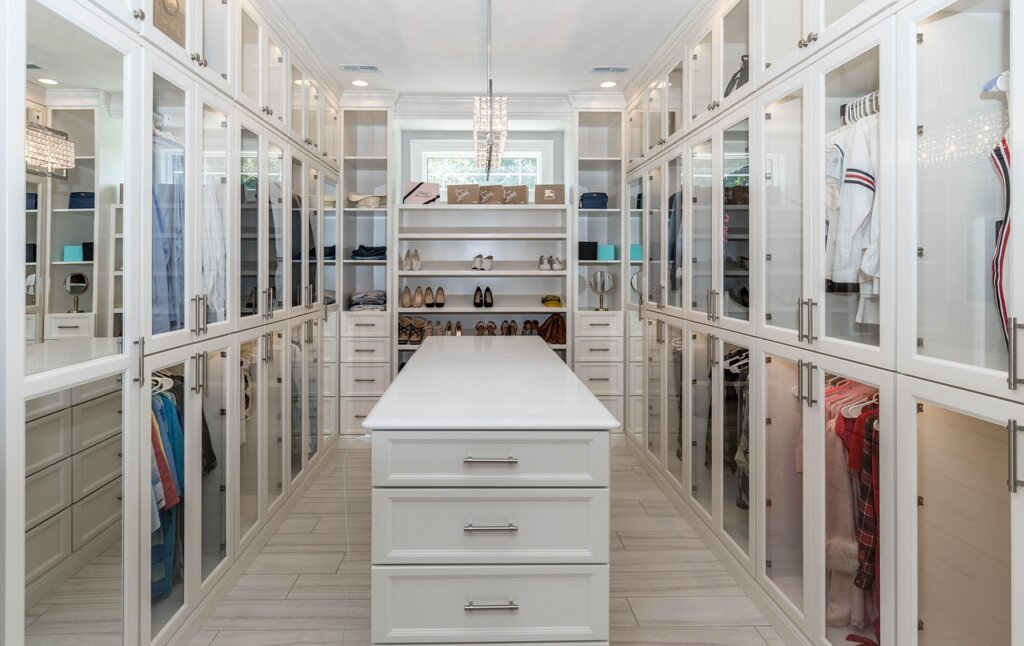 closet divided into four zones labeled by clothing type