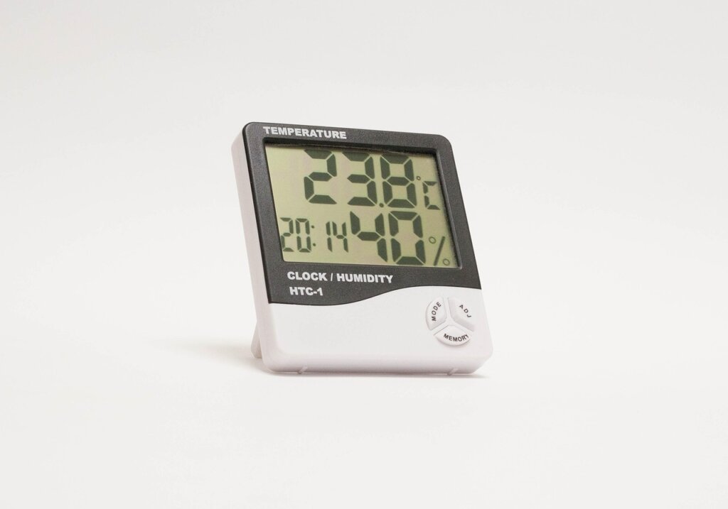 digital hygrometer placed inside kitchen cabinet showing humidity level