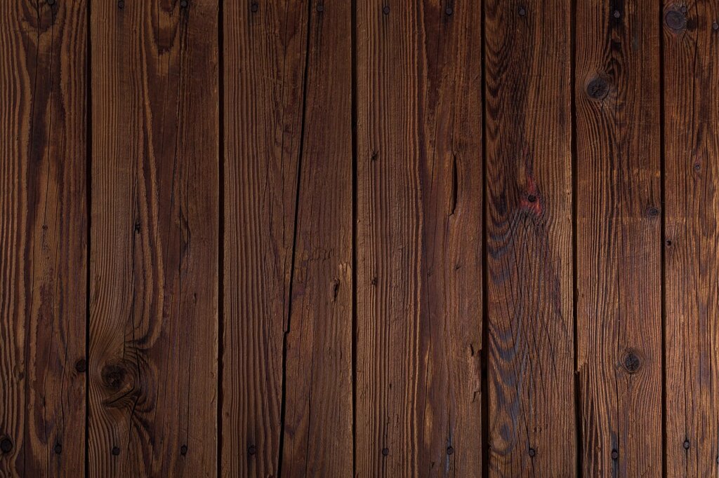 under sink mold and moisture on wooden cabinet panel