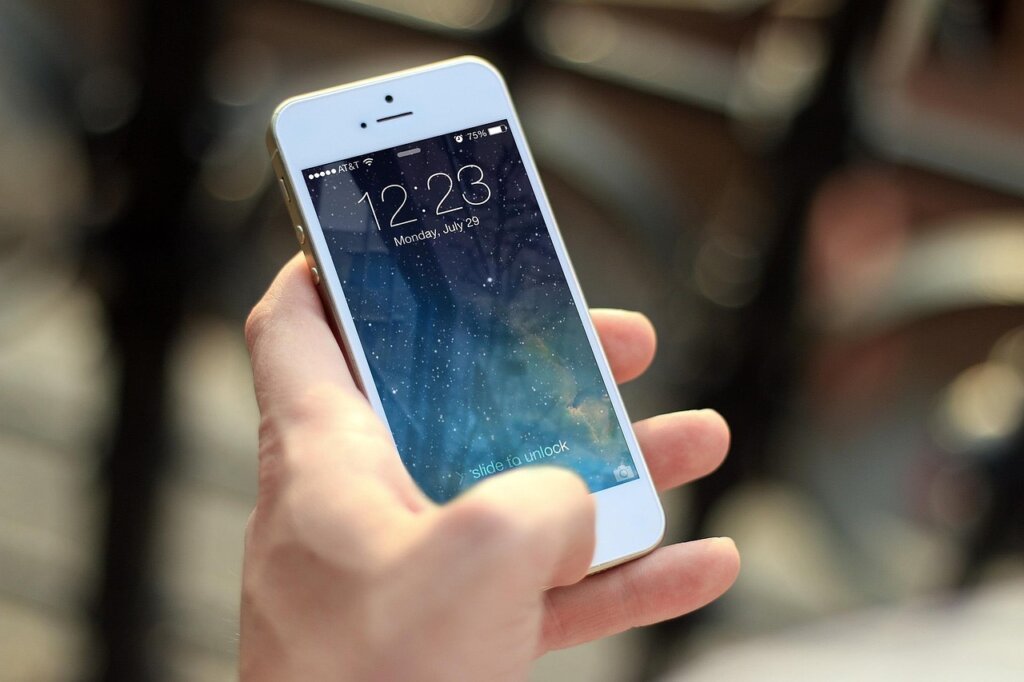 gas utility bill comparison on smartphone screen showing reduced heating cost