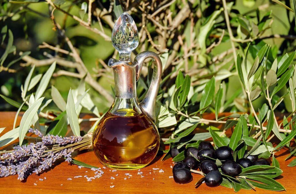 olive oil applied on sticky residue on plastic container