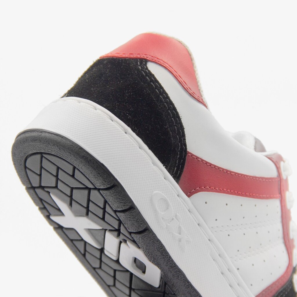 white rubber sneaker sole scrubbed with diluted bleach solution using stiff brush