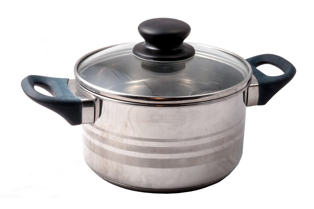 acetic acid bottle and stainless pot on kitchen counter