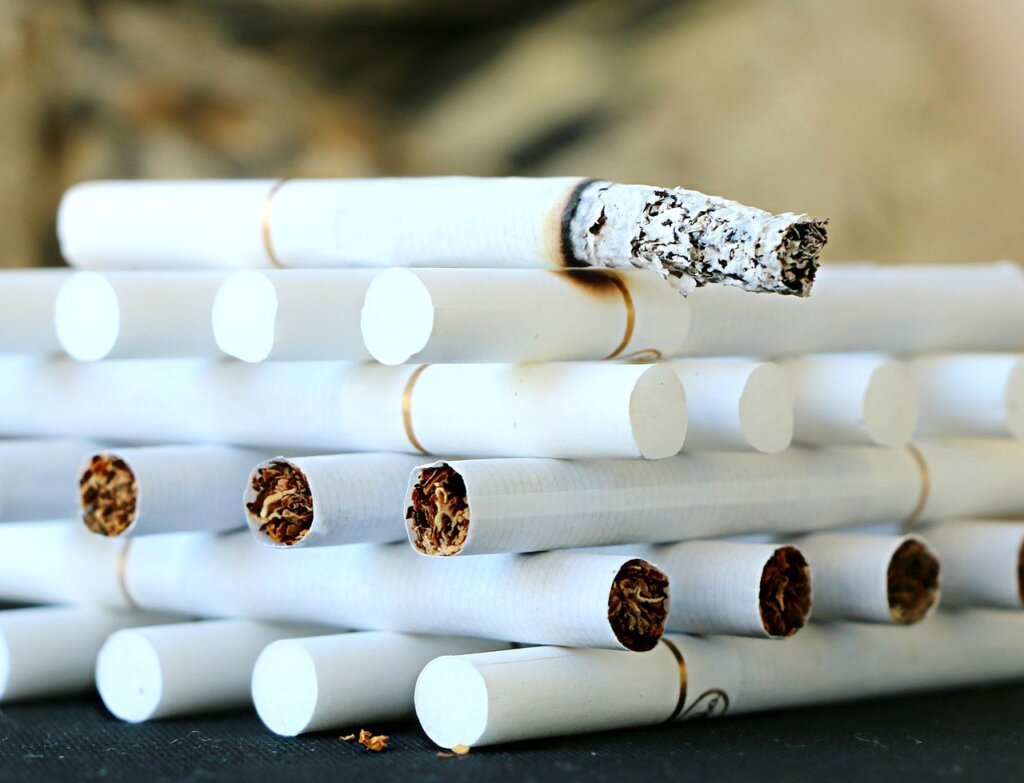 baking soda sprinkled on burned pot bottom with white foam forming