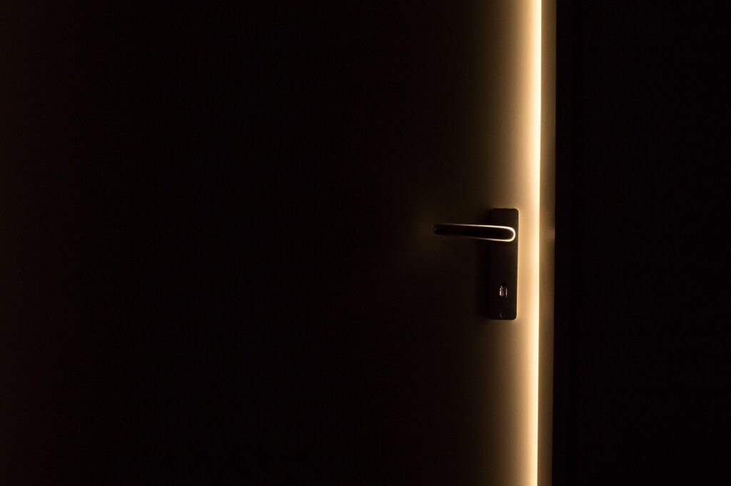 steamy bathroom door open after shower spreading humidity