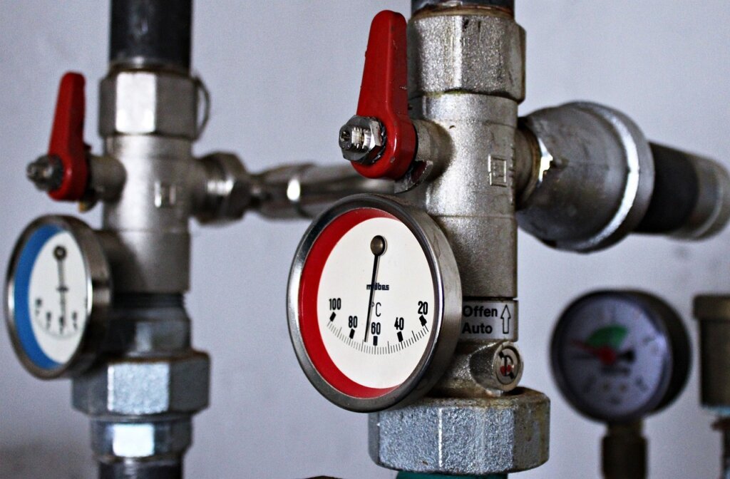apartment heating system thermostat set to high temperature